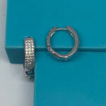 Triple hilera a bisagra