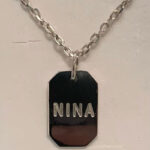 Identidad pequeña, 2,4 cms largo