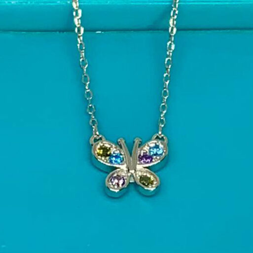 centro con piedras multicolor