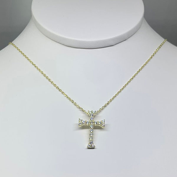 Dorada cruz con piedras